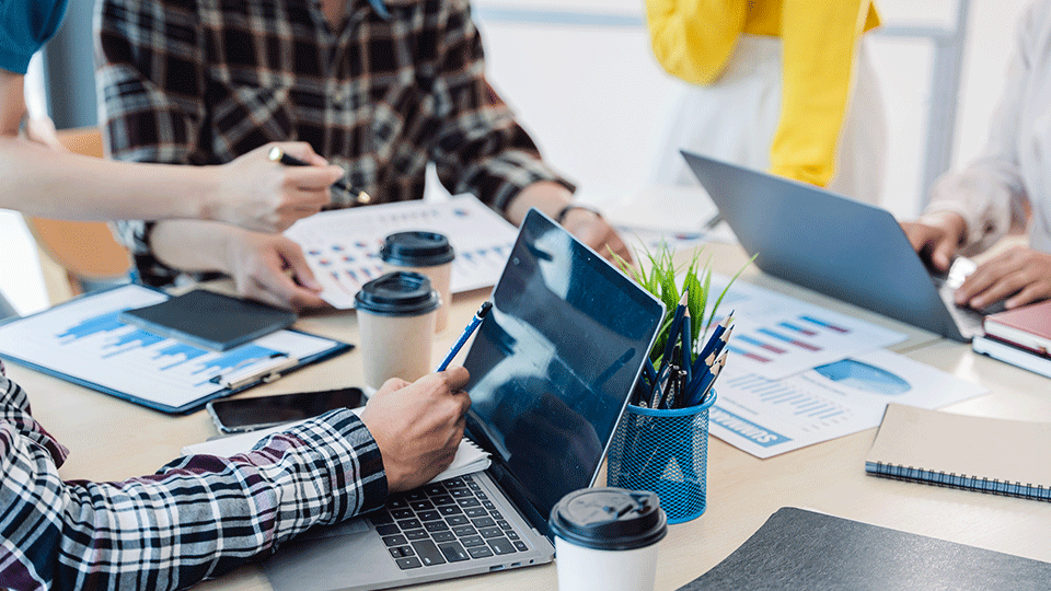 Interns-Collaborating-Around-Table